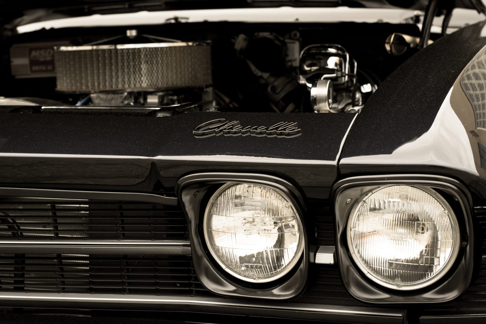 black and white vehicle engine bay